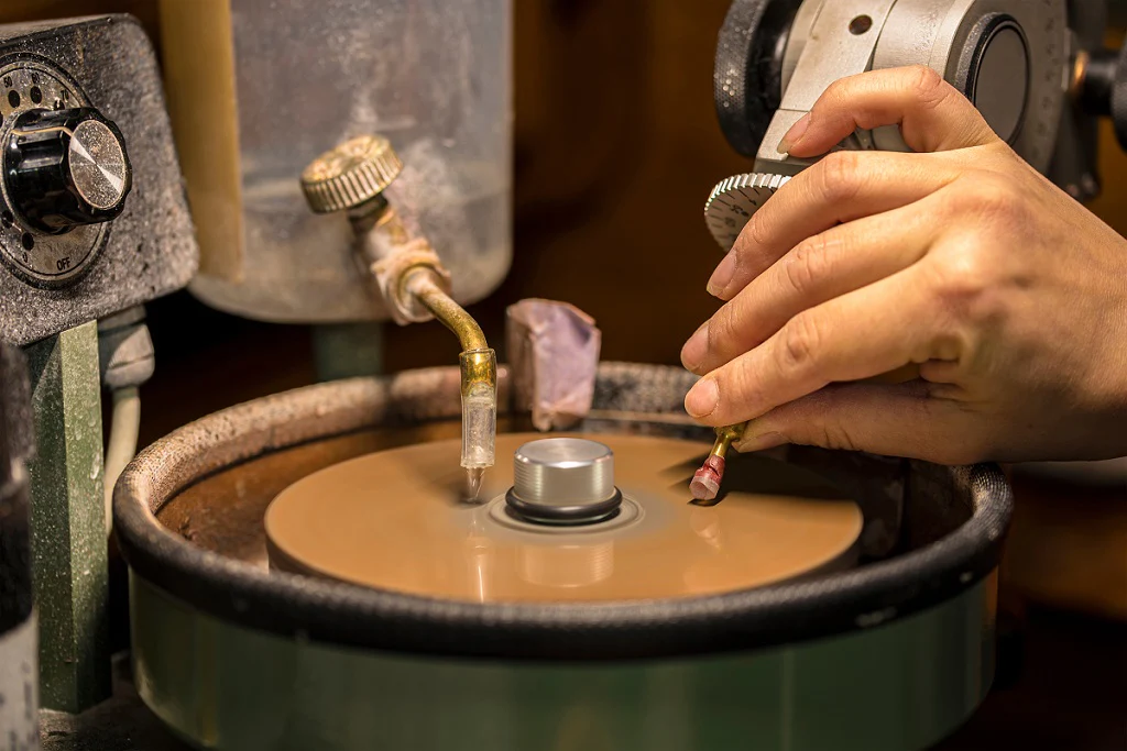  A Sri Lankan lapidary at work, revealing the hidden beauty of a gem.